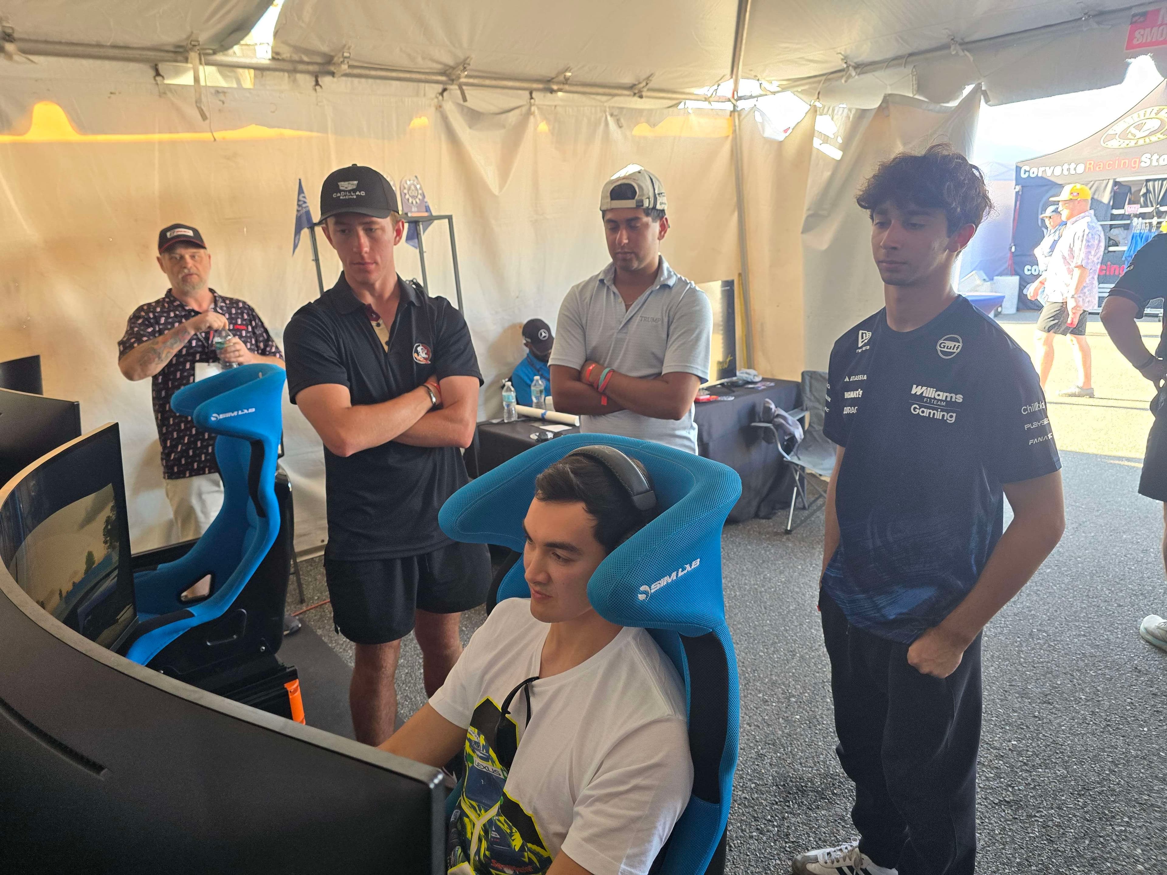 Drivers watching the simulator action